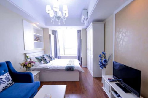 Photo 3 - Dalian Yijia Apartment Sanba Square