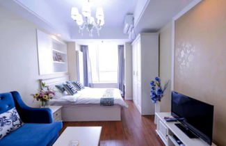 Photo 3 - Dalian Yijia Apartment Sanba Square