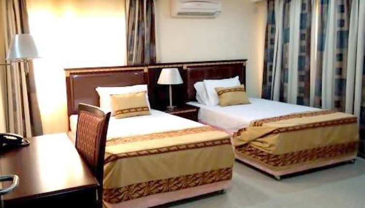 Photo 1 - Beni Apartment And Suites