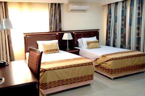 Photo 1 - Beni Apartment And Suites