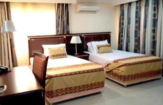 Photo 1 - Beni Apartment And Suites