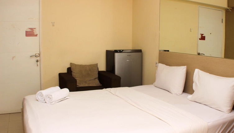 Photo 1 - Comfy And Best Location Studio Room At Bassura City Apartment