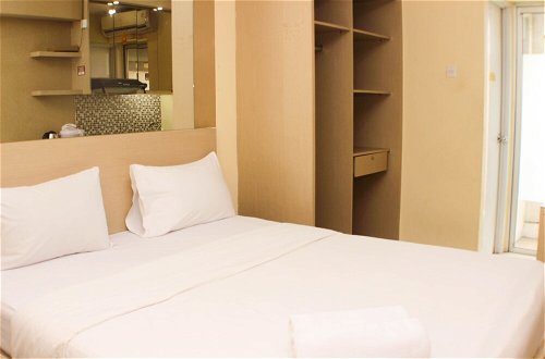 Photo 3 - Comfy And Best Location Studio Room At Bassura City Apartment