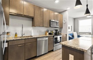 Photo 3 - Modern 1BR King Suite Close to Downtown w Fast Wifi