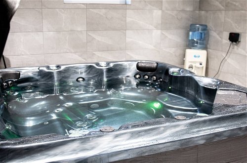Photo 55 - Private Hot Tub, Sauna, Ice Bath Gym Apartment