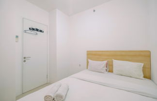 Photo 3 - Minimalist and Cozy Living 2BR at Bassura City Apartment