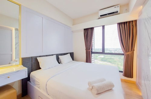 Photo 1 - Restful And Comfy 2Br At Sky House Bsd Apartment By Tarvelio