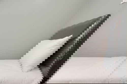 Foto 2 - Restful And Modern 3Br At Daan Mogot City Apartment