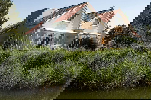 Foto 1 - Holiday Home on the Water in Friesland