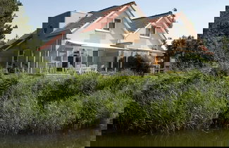 Foto 1 - Holiday Home on the Water in Friesland