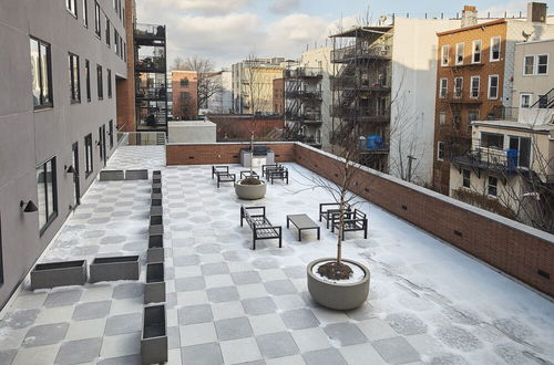 Photo 20 - Modern 3 BR Loft -shared Deck - gym - Mins to NYC