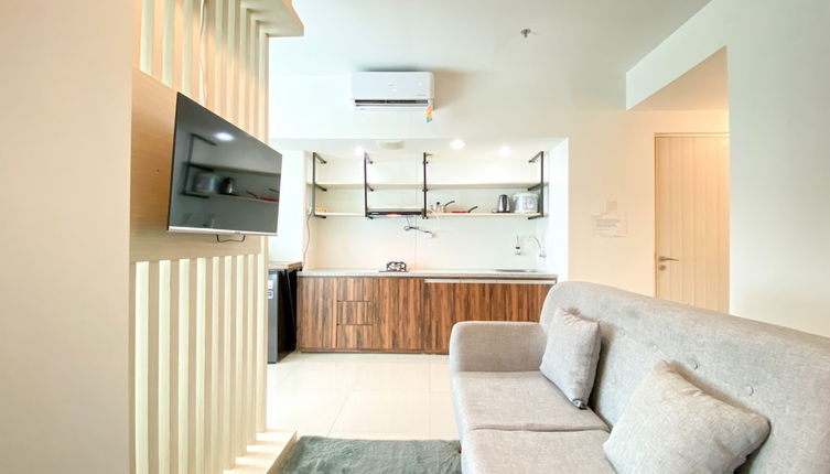 Photo 1 - Minimalist And Strategic Studio Apartment At Grand Kamala Lagoon