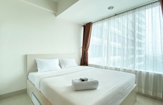 Foto 2 - Minimalist And Strategic Studio Apartment At Grand Kamala Lagoon