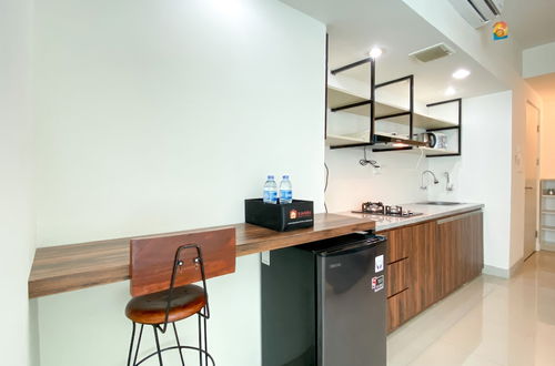 Photo 11 - Minimalist And Strategic Studio Apartment At Grand Kamala Lagoon