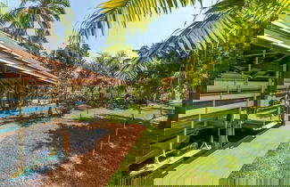 Foto 2 - NEW Jungle Paradise Treehouse Suite With Resort Amenities Elevator Access Outdoor Kitchen Lagoon Lazy River Pool RV Hook up