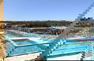 Foto 1 - Marina View 1 Bedroom Apartment w Swimming Pool