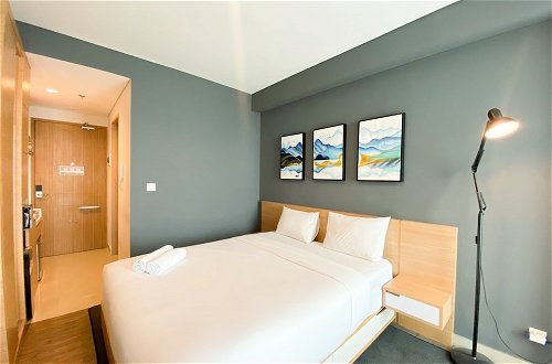 Foto 4 - Simply Look And Warm Studio Room Tamansari Iswara Apartment