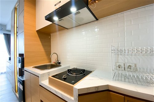 Foto 7 - Simply Look And Warm Studio Room Tamansari Iswara Apartment