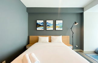 Foto 1 - Simply Look And Warm Studio Room Tamansari Iswara Apartment
