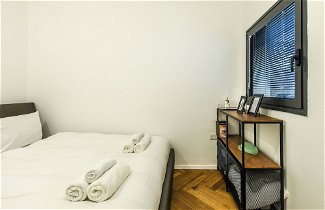 Photo 3 - Stylish 3BR Apt with Patio in the City