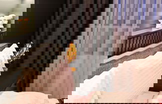 Photo 15 - TAKS-INN Suites