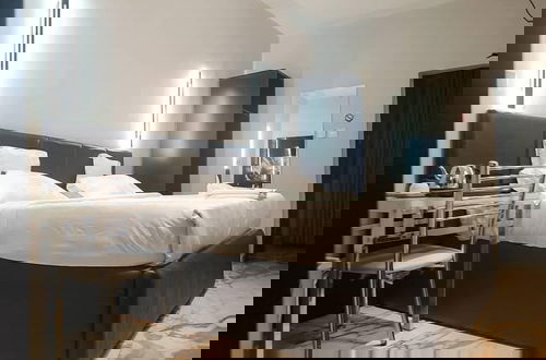 Foto 5 - Triple Tee Luxury Hotel