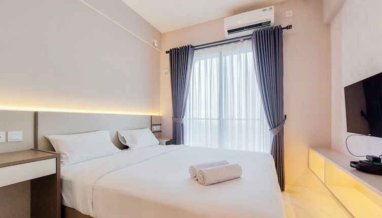 Foto 1 - Cozy And Best Deal Studio Room Sky House Bsd Apartment