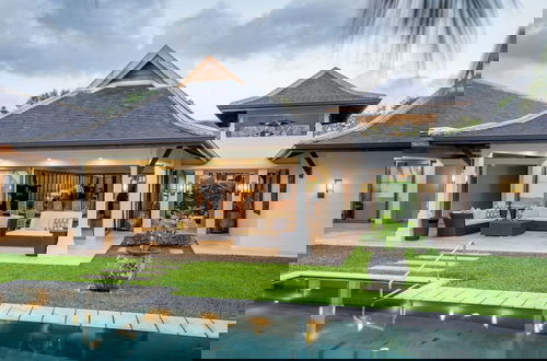 Foto 11 - Miskawaan Beachfront Villas