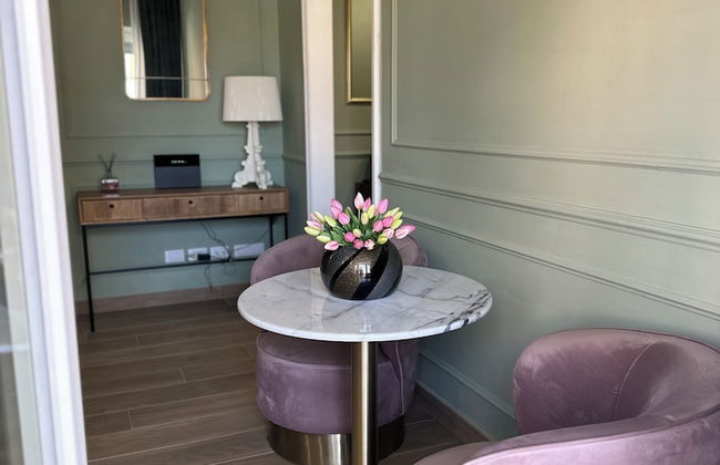 NLM Boutique Suites - Photo 32