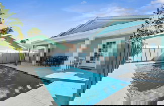 Photo 1 - Beach Home w Heated Pool Free Golf Cart