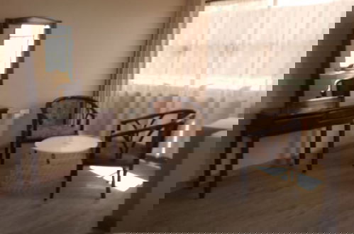 Foto 4 - Myriad stays beachfront