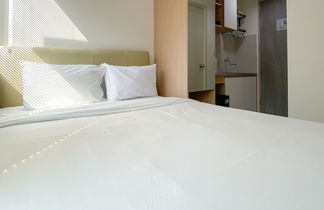 Photo 2 - Cozy And Simply Studio Room At Osaka Riverview Pik 2 Apartment