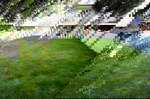 Foto 17 - Large Holiday Apartment With a Garden in Stepnica