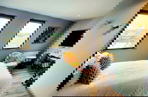 Foto 77 - Pinnacle Suites