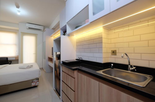 Photo 19 - Cozy Living And Homey Studio Transpark Cibubur Apartment