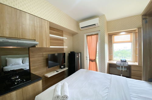 Photo 11 - Cozy Stay Studio Room At Springlake Summarecon Bekasi Apartment