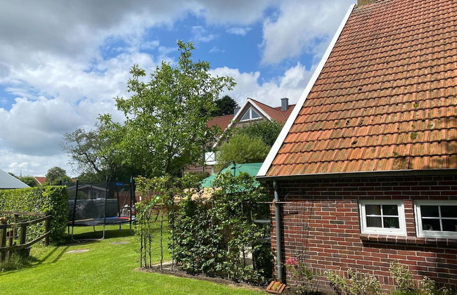 Reihenhauser in Strackholt - Foto 26