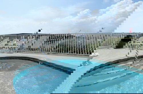 Photo 19 - Harbour Place 102- Gulf-front Pool hot tub