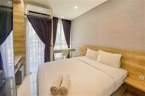 Photo 1 - Restful And Comfortable Studio At Ciputra World 2 Apartment