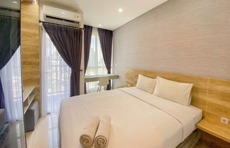 Photo 1 - Restful And Comfortable Studio At Ciputra World 2 Apartment