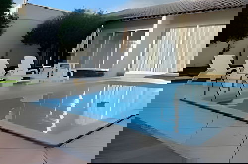 Photo 33 - Casa com piscina 5 suites 1 quarto e AC