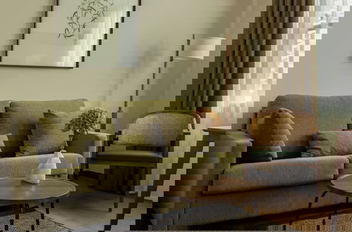 Photo 22 - Batimont Suites & Apartments