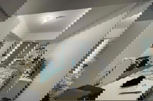Foto 2 - The Comfy Loft at Azure North