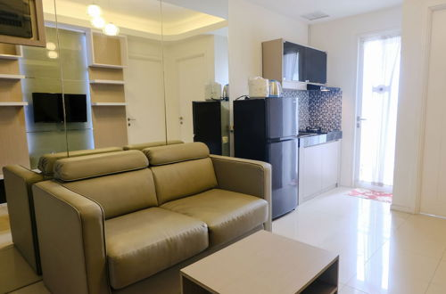 Photo 10 - Comfy 2Br Apartment At Parahyangan Residence