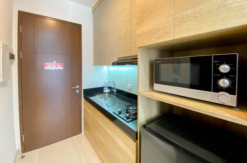 Foto 6 - Comfort And Modern Look Studio Room Ciputra World 2 Apartment