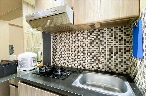 Foto 6 - Modern Look And Restful 2Br Bassura City Apartment Near Mall