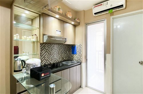 Foto 9 - Modern Look And Restful 2Br Bassura City Apartment Near Mall