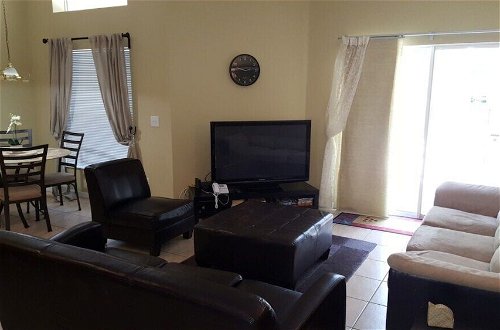 Photo 15 - Escape To A 4br, 3ba W/recreation Room 4 Bedroom Villa by RedAwning