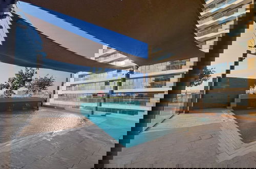 Foto 32 - Modern 2BR w Direct Beach Access Emaar Beachfront