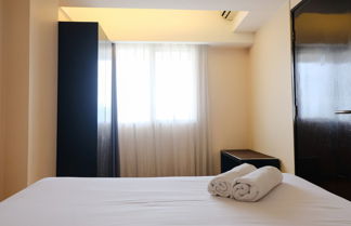 Photo 2 - Homey 2Br At Braga City Walk Apartment